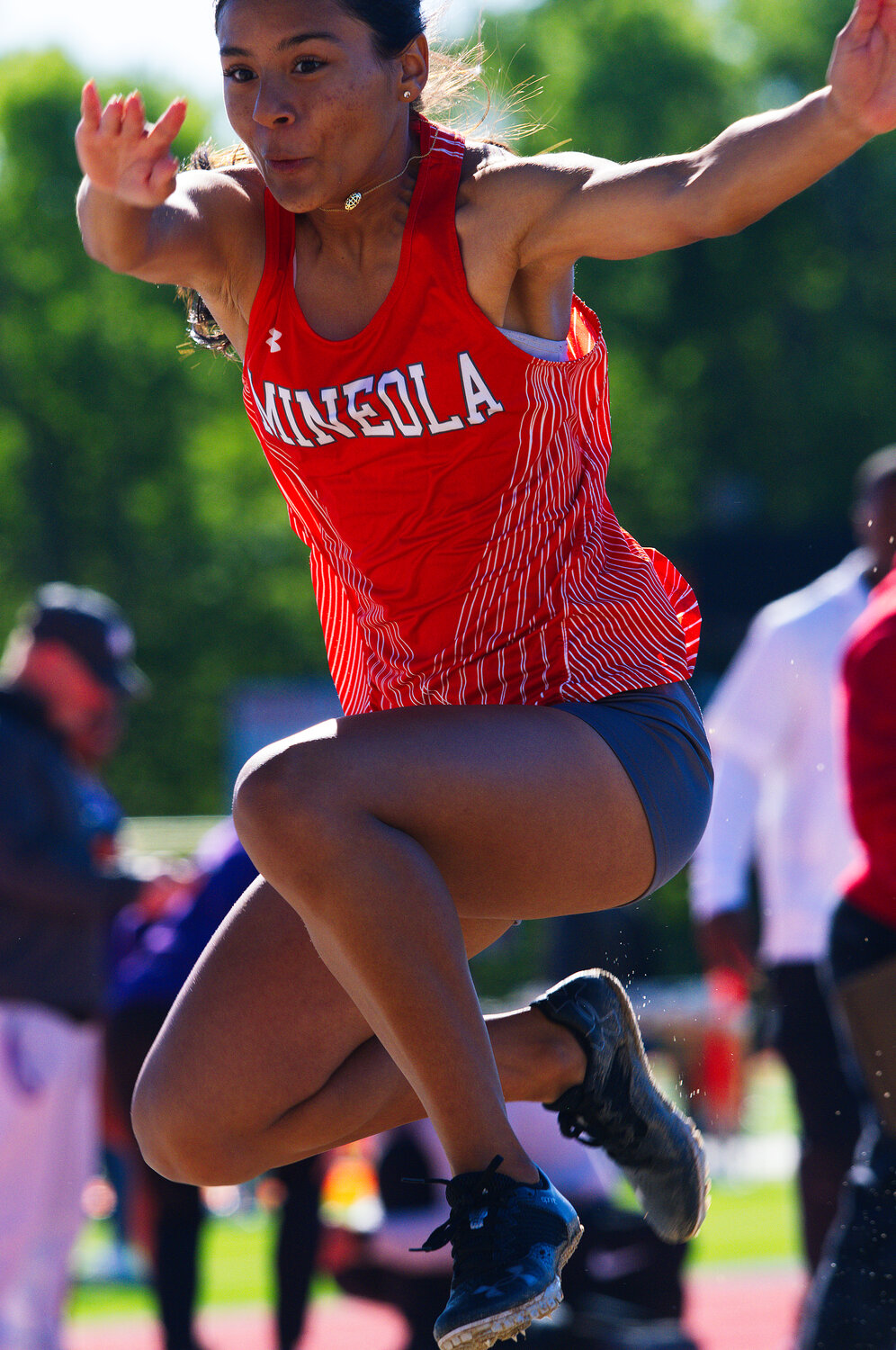 Stephanie Rojas bounded 31'8.5" for sixth place in the triple jump. [see more speed and strength on display]